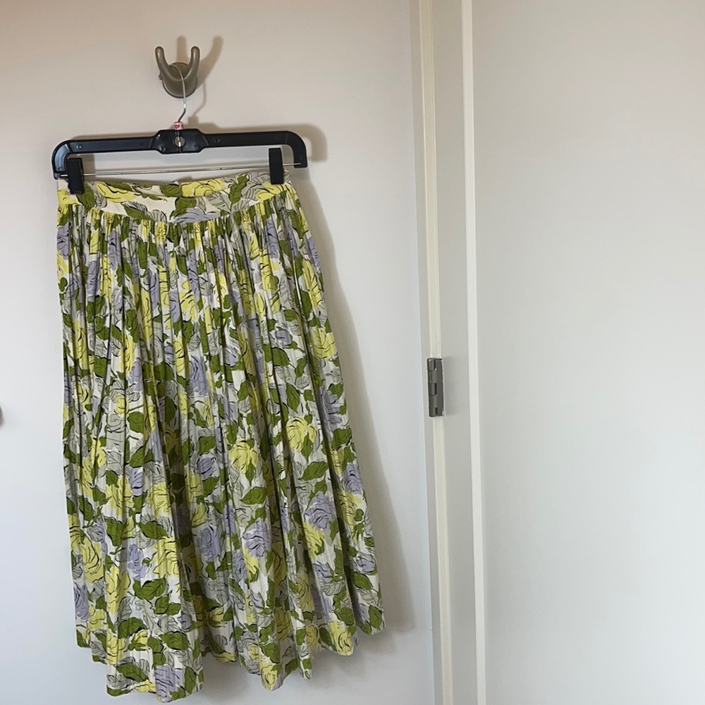 Long colorful skirt.